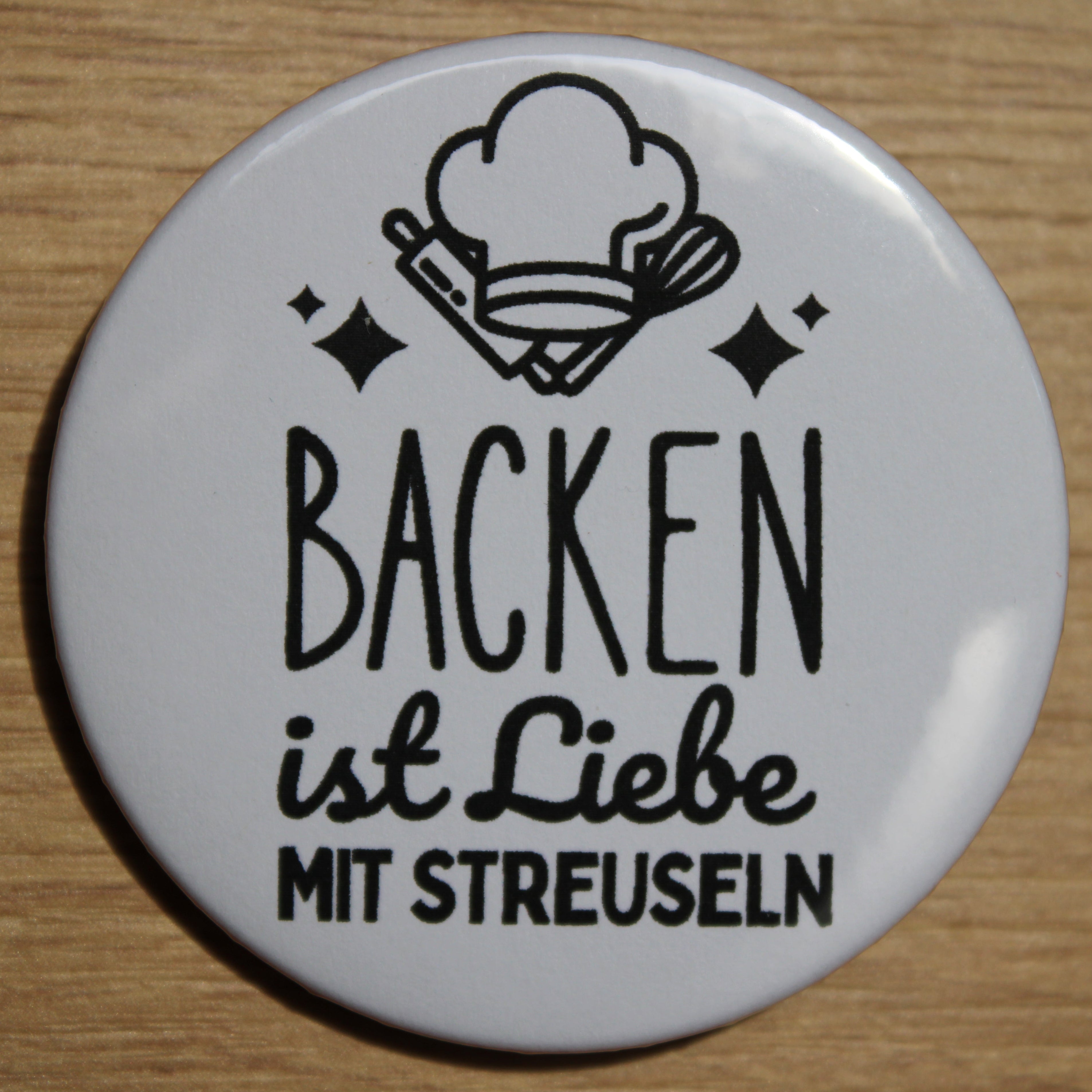 Button - „Backen ist Liebe mit Streuseln“