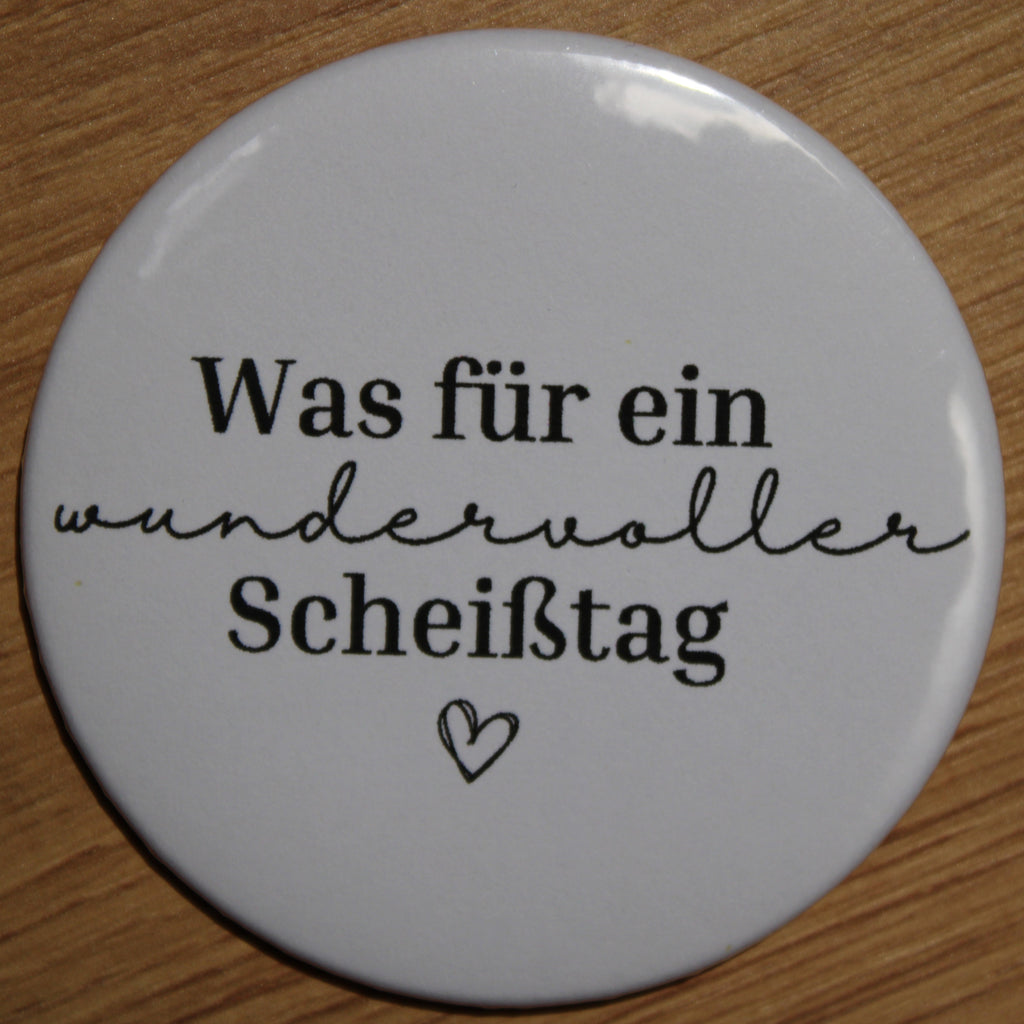 Button - „Was für ein wundervoller Scheißtag“